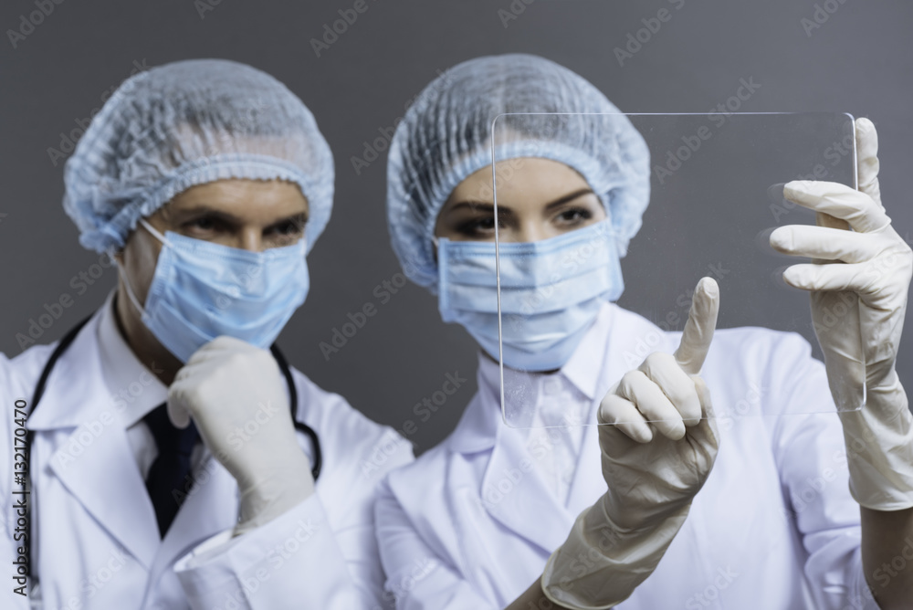 Man and woman discovering medical glass Man and woman discovering medical glass