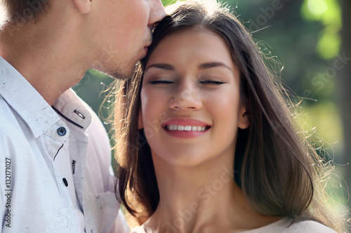 Beautiful young couple outd...
