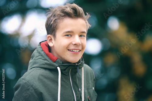 Portrait of cheerful teenag...