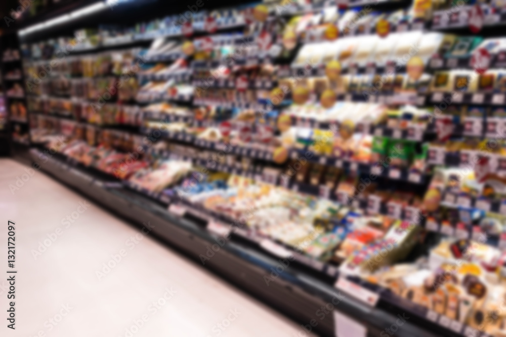 Supermarket blur background with miscellaneous product shelf