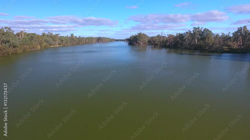 Aerial view of houseboat holiday on the Murray River Australia.
Aerial view of houseboat holiday on the Murray River Australia.