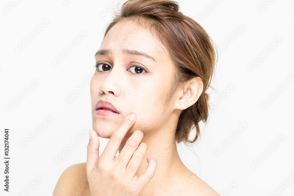 beauty girl of half latina and half asian who checks her skin, skin care, acne treatment beauty girl of half latina and half asian who checks her skin, skin care, acne treatment