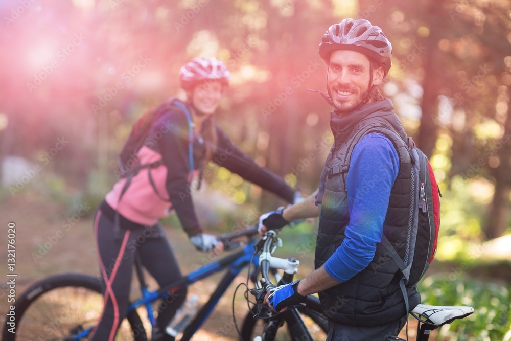 Obraz premium Biker couple standing together