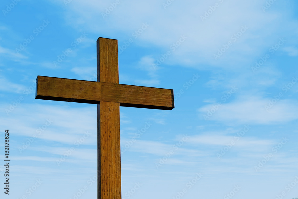 Wooden cross on sky background