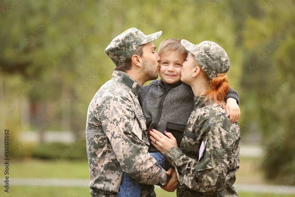 Military family reunited on a sunny day