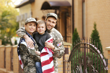 Military family reunited on a sunny day