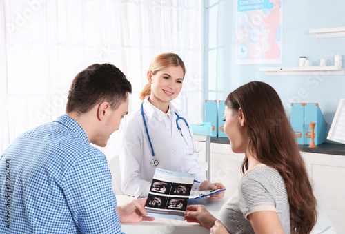 Future parent with doctor a...
