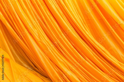 Yellow cloth for monks and Buddha statue