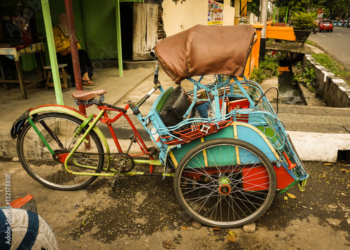 A colorful pedicab as traditional transportation in Semarang Indonesia