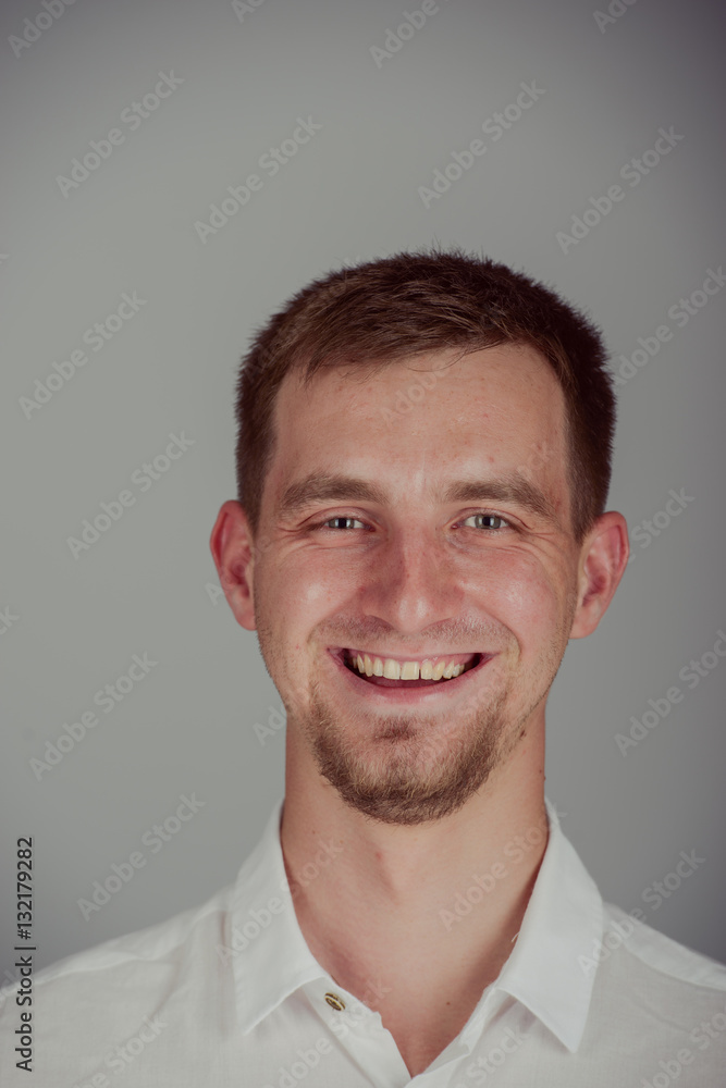 Obraz premium Portrait of a smiling young man