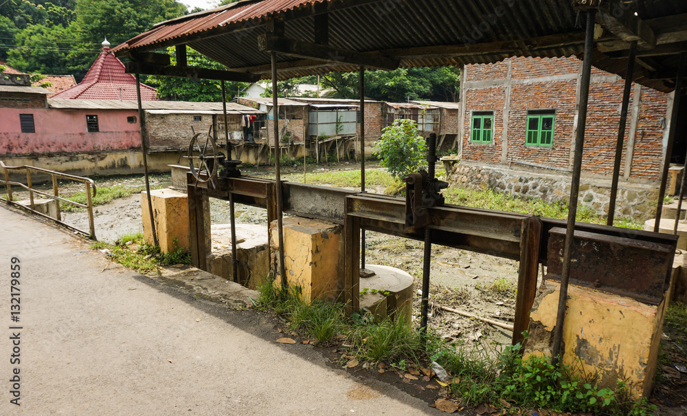 Abandoned sluice gate control photo taken in Semarang Indonesia Abandoned sluice gate control photo taken in Semarang Indonesia