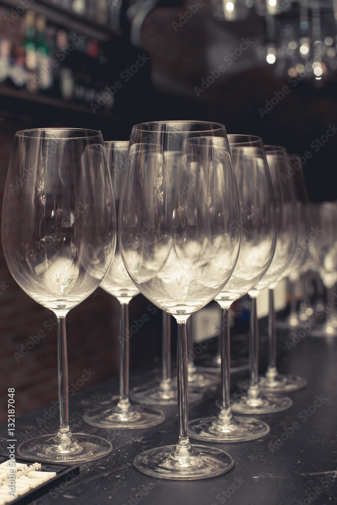 wine glass on black table setup for party in the bar with vintag wine glass on black table setup for party in the bar with vintag