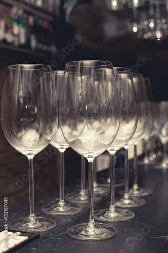 wine glass on black table setup for party in the bar with vintag