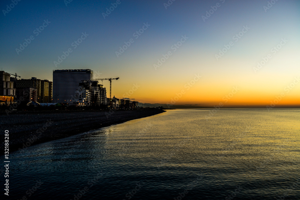 Obraz premium Sunset near city