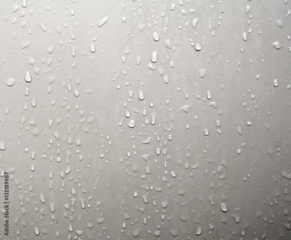 Water droplets adhered on the bathroom door. Water droplets adhered on the bathroom door.