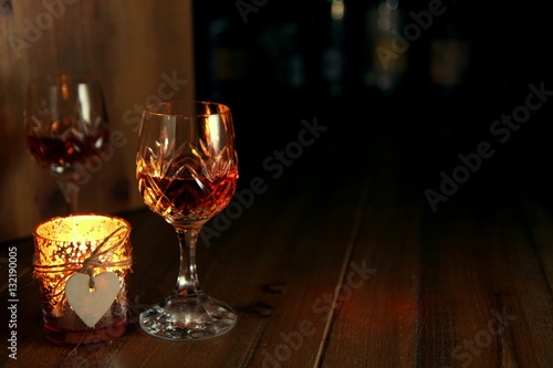 Valentines Day Romantic Drinks by candle light with copy space for text