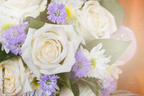 Close up bouquet of mixed flowers with sunlight effect