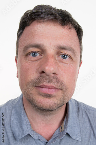 Funny portrait of a man deformed by the camera