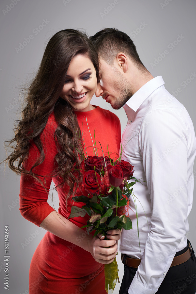 Woman with a bunch of red roses Woman with a bunch of red roses
