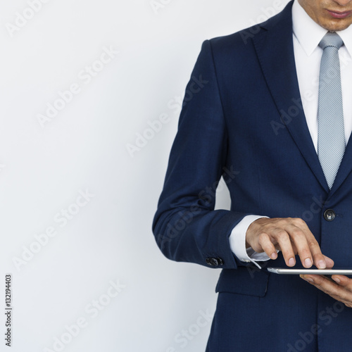 Businessman Standing Holding Tablet Concept