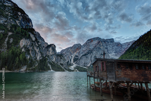 Hut on Braies lake and Dolomiti on sunrise, Trentino Alto Adige, Italy