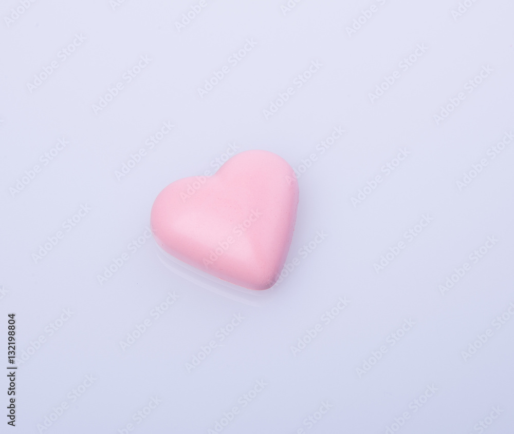 chocolate in pink colour or love shape chocolate.