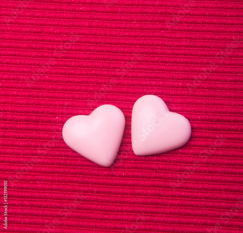 chocolate in pink colour or love shape chocolate.