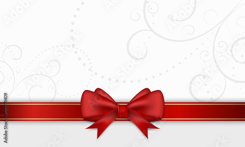 Gift card with red ribbon and bow.