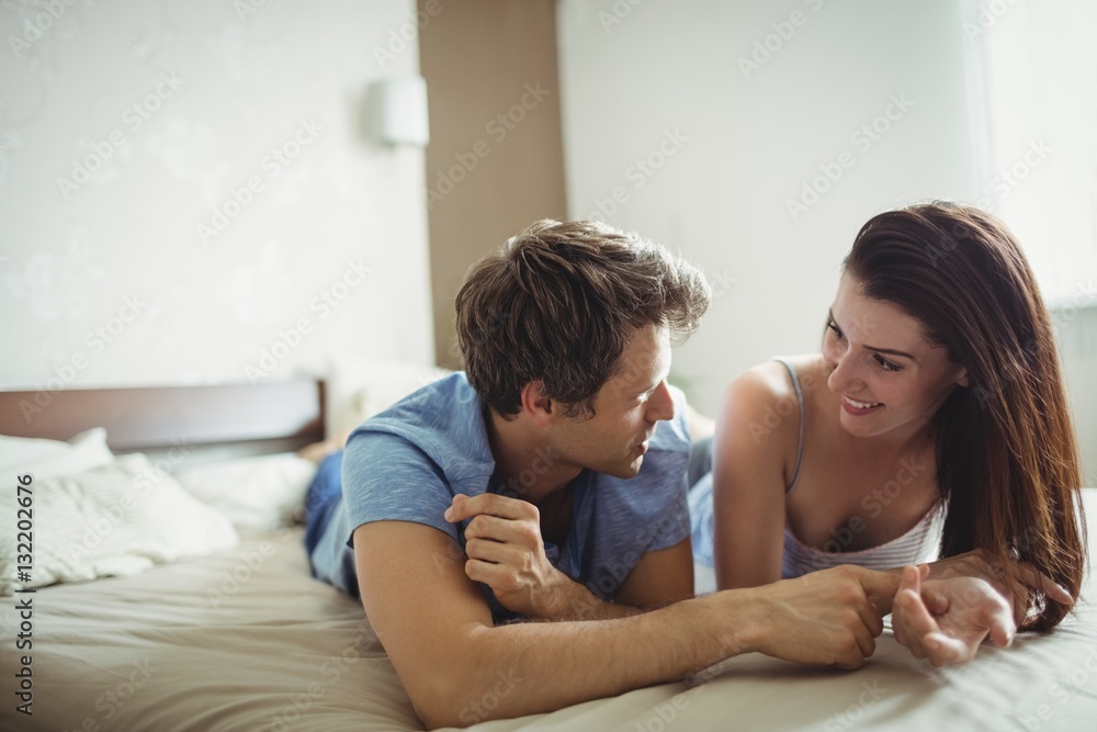 Romantic couple relaxing on bed Romantic couple relaxing on bed