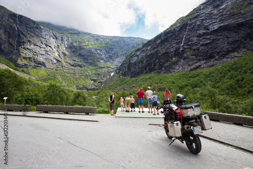 People looking toTrollstigen mountain road © lkoimages