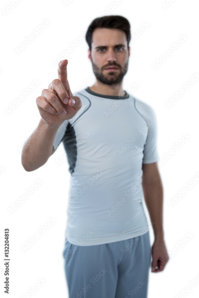 Man pretending to touch an invisible screen Man pretending to touch an invisible screen
