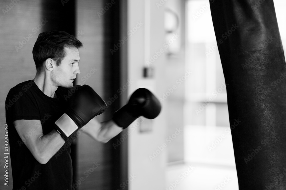 Black-white photo of young sportsman