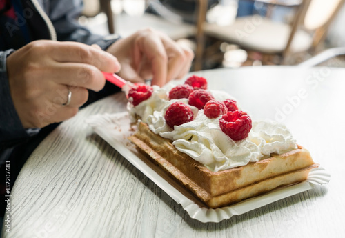 women eating belgian waffles photo