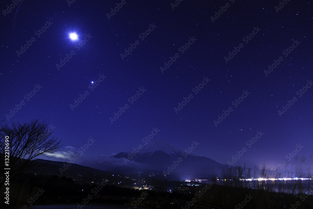 Naklejka premium Starry Sky and Mount Fuji from Lake Yamanakako observatory