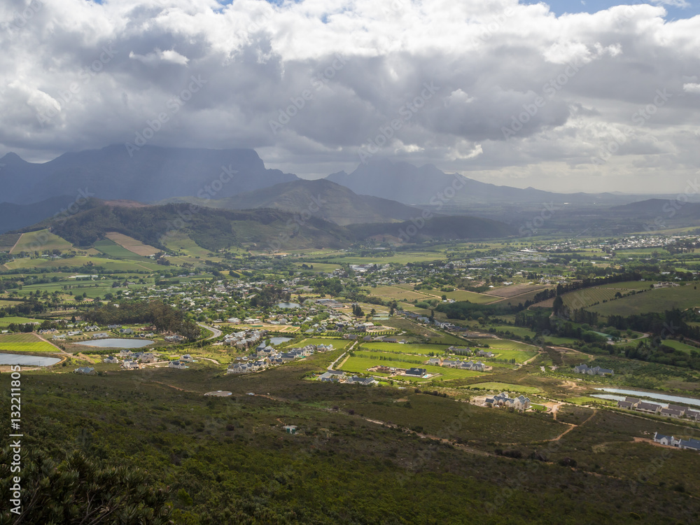Panoramic view over scenic little town Franschoek with dramatic sky