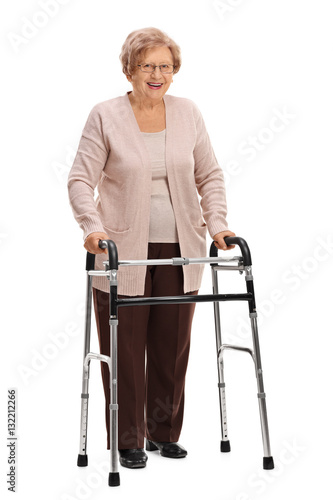 Yoyful mature woman with a walker