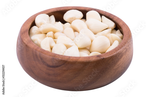 Garlic on wooden bowl