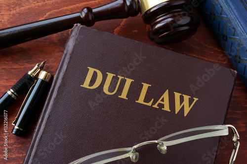 DUI Law title on a book and gavel. photo