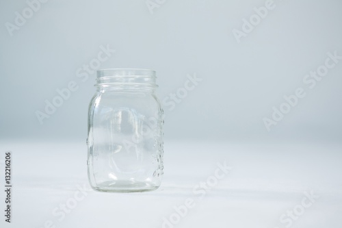 Close-up of empty glass jar
