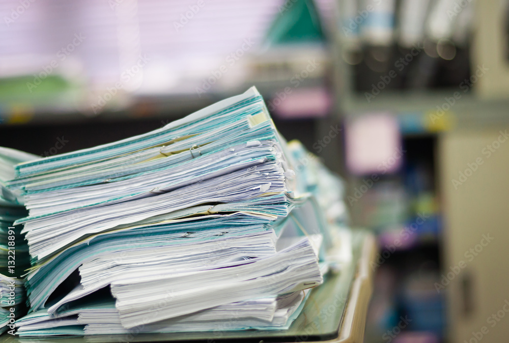 Document on desk in work office.(Soft focus.) Document on desk in work office.(Soft focus.)