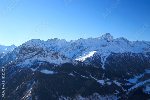 Winter landscape in Alps with Courmayeur ski resort