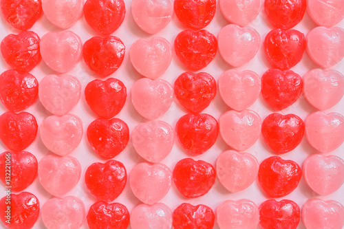 Photos heart shape candy on paper background