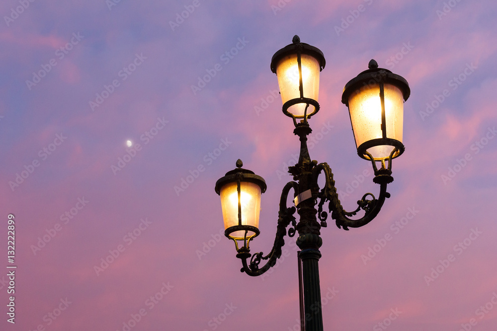 Lamp post with twilight sky.