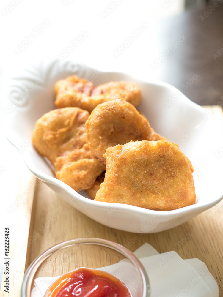 chicken nugget and delicious menu on beautiful plate in a restaurant. chicken nugget and delicious menu on beautiful plate in a restaurant.