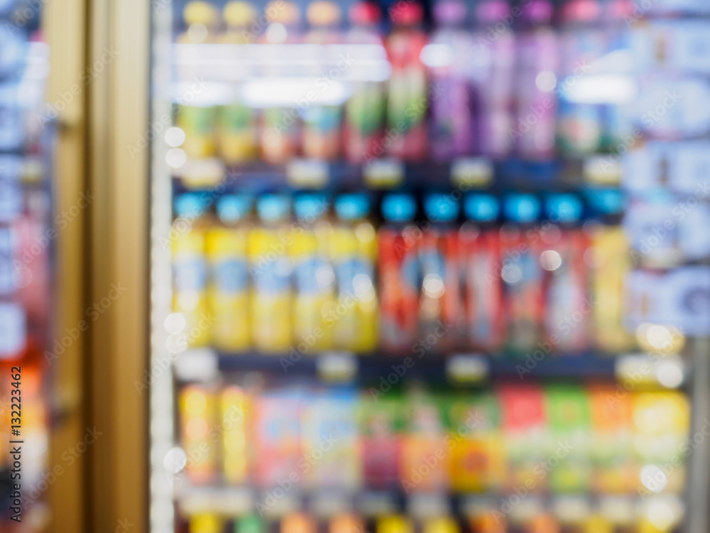 supermarket refrigerator shelves with beverage products