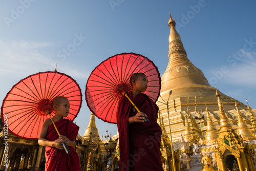 Couple monks travelling in Shwedagon Pagoda
