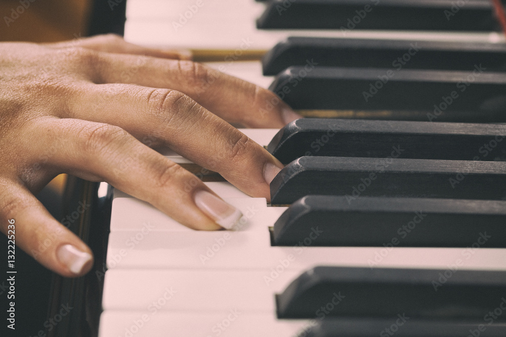 A woman playing piano
