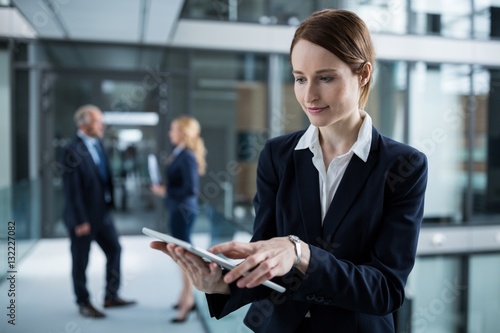 Businesswoman using digital tablet 