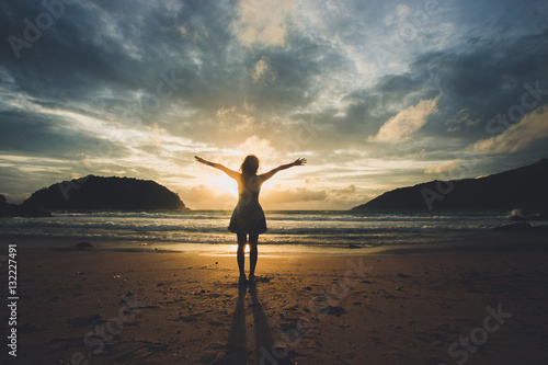 Freedom and happiness woman on the beach