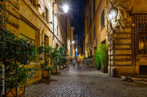 Fototapeta Naklejka Na Ścianę i Meble -  Night view of old cozy street in Rome, Italy